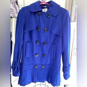 Worthington double breasted with ruffle at the bott blue coat size small .. NEW